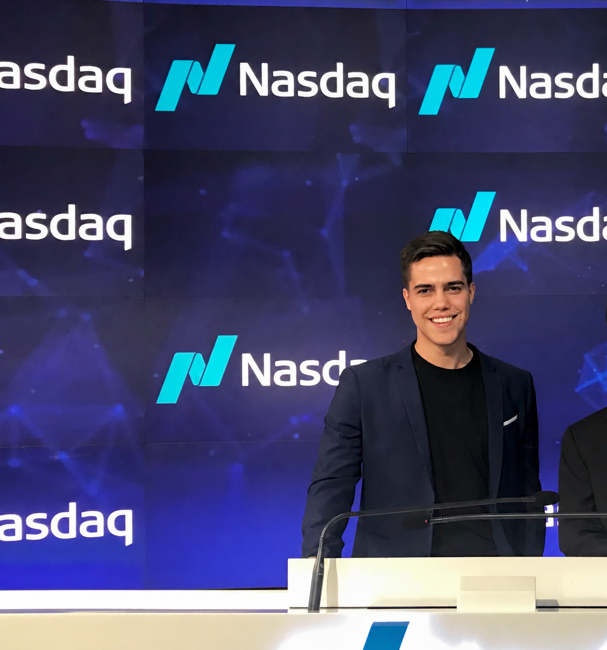 Zach Medina speaking at Nasdaq headquarters in Times Square